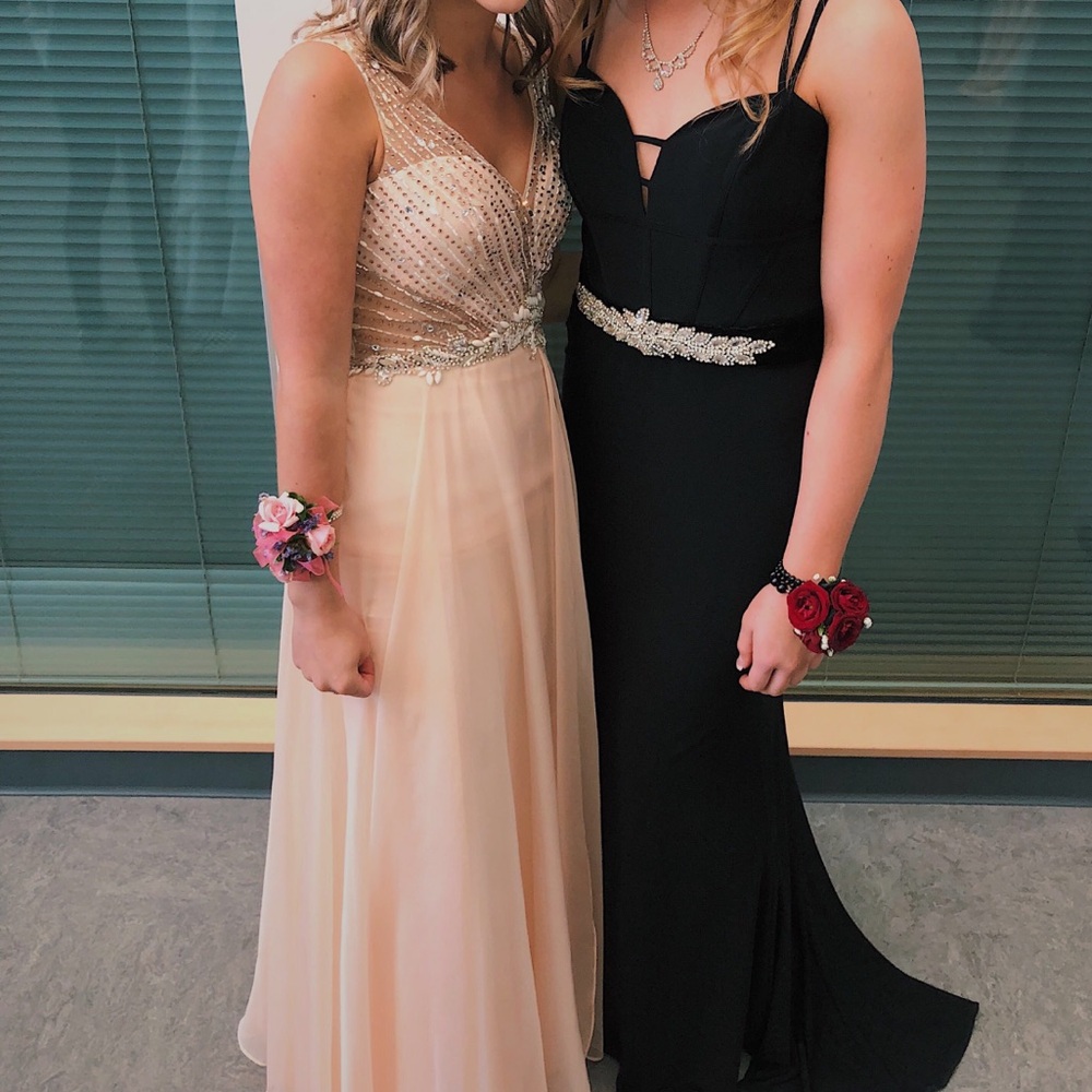 Pink dress on the left